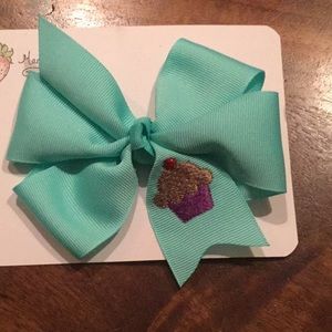 Aqua embroidered cupcake bow.